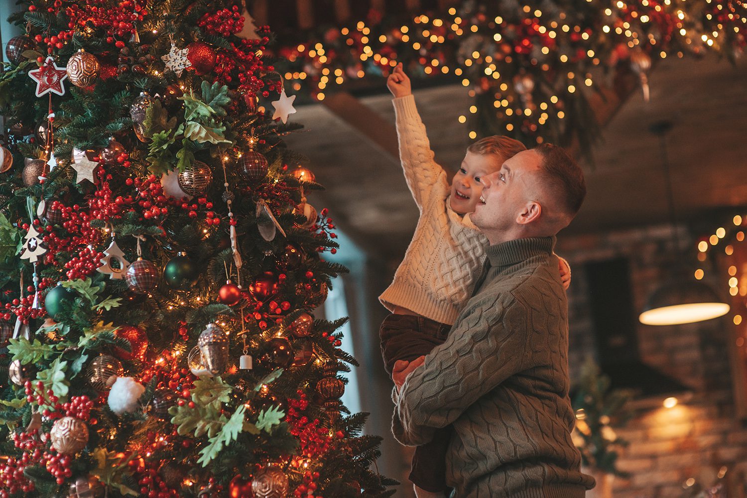 https://website.brushcreekranch.com/wp-content/uploads/2022/08/Family-Decorating-Tree.jpg